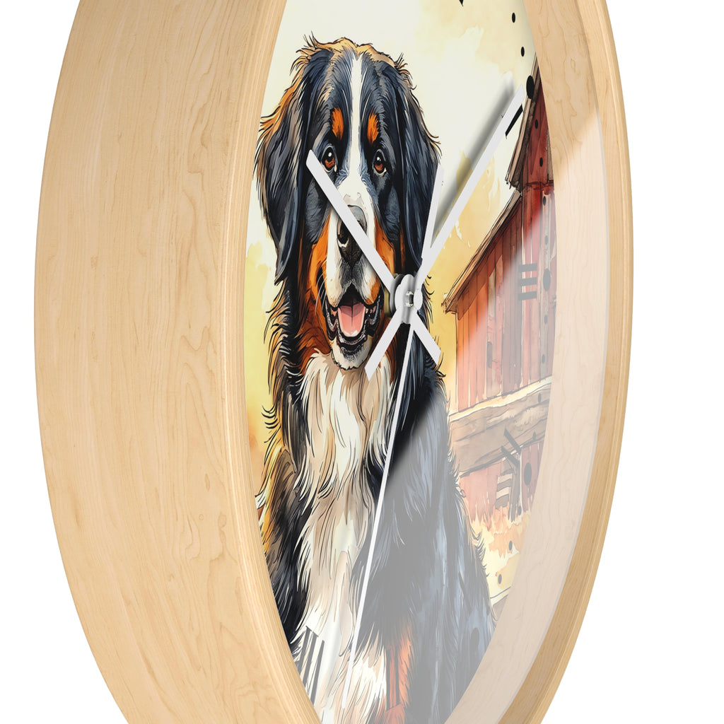 Oval wall clock with a light natural wood frame and a printed illustration of a Bernese mountain dog in front of a red barn on the face.
