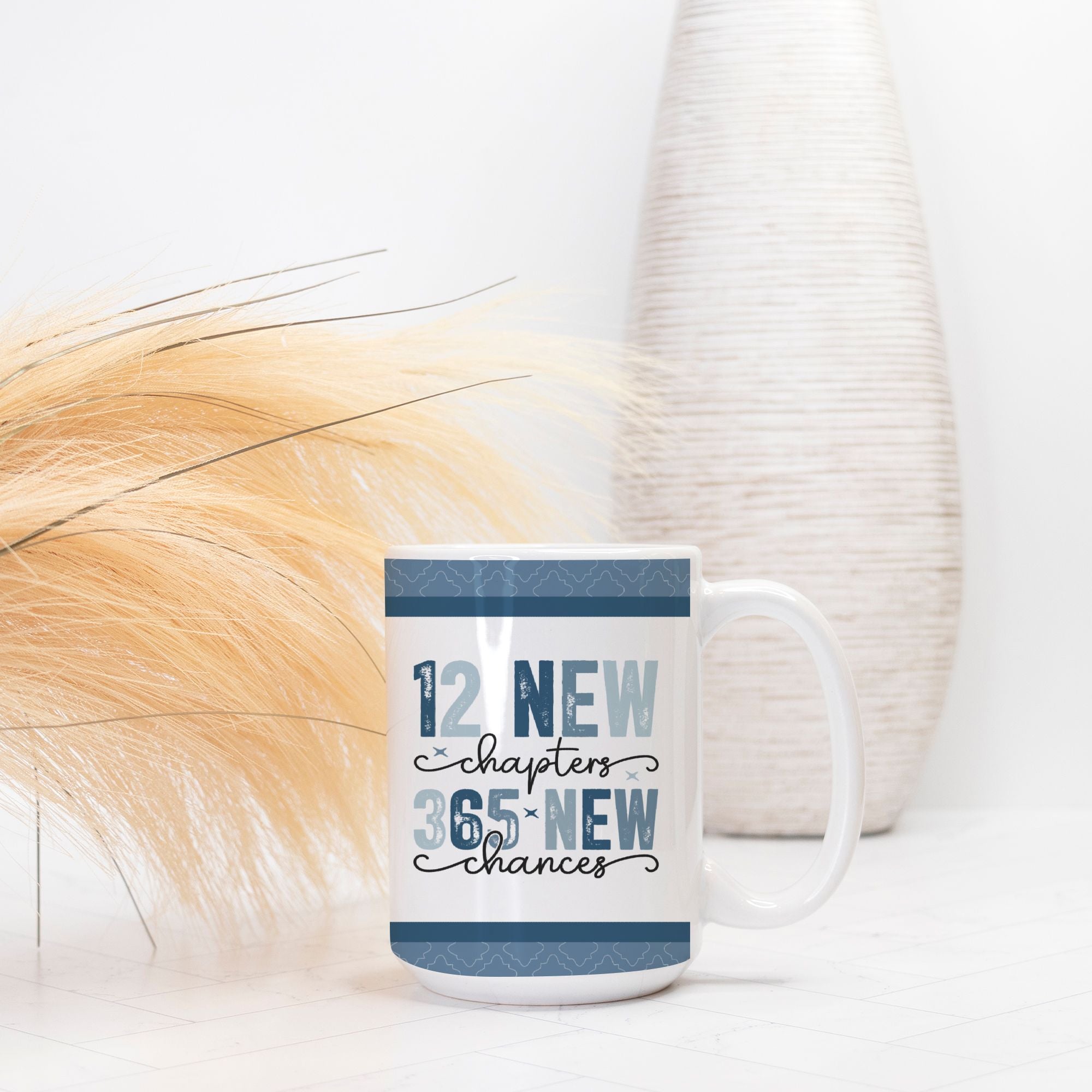 Mug with motivational quote on a white surface with decorative elements