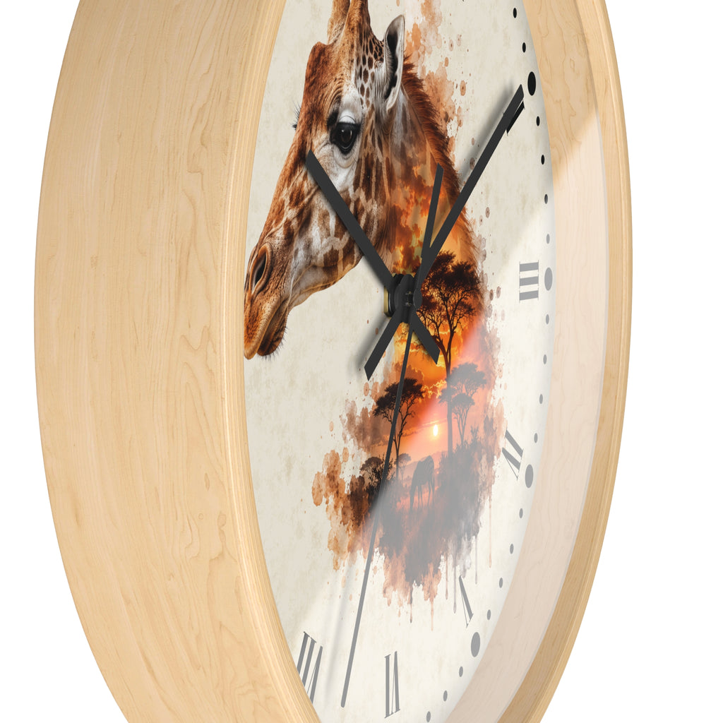 A round wall clock with a light natural wood frame and a white clock face featuring a painted giraffe head and warm-toned sunset landscape.