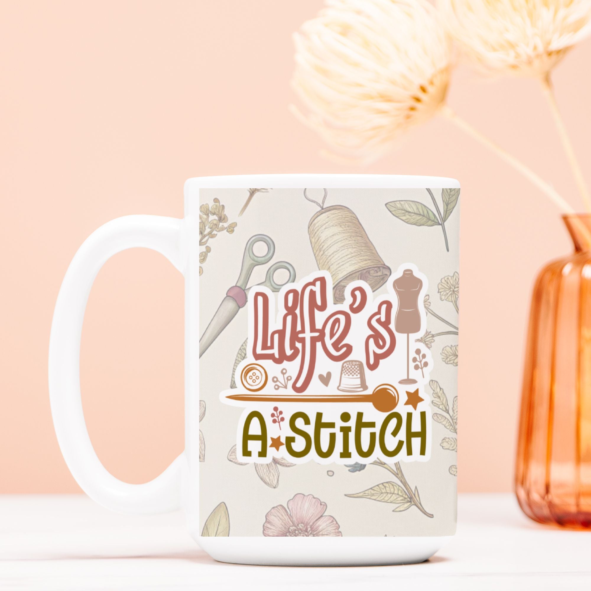 White mug with 'Life's a Stitch' design on a light pink background
