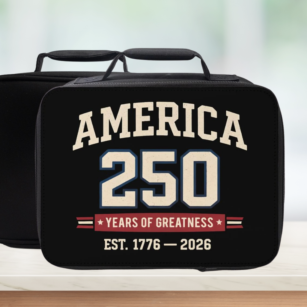 Black lunch bag with 'America 250 Years of Greatness' text on a blurred background