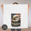 Person holding an extra large tea towel with an eagle and American flag design, celebrating the 250th anniversary of the United States.