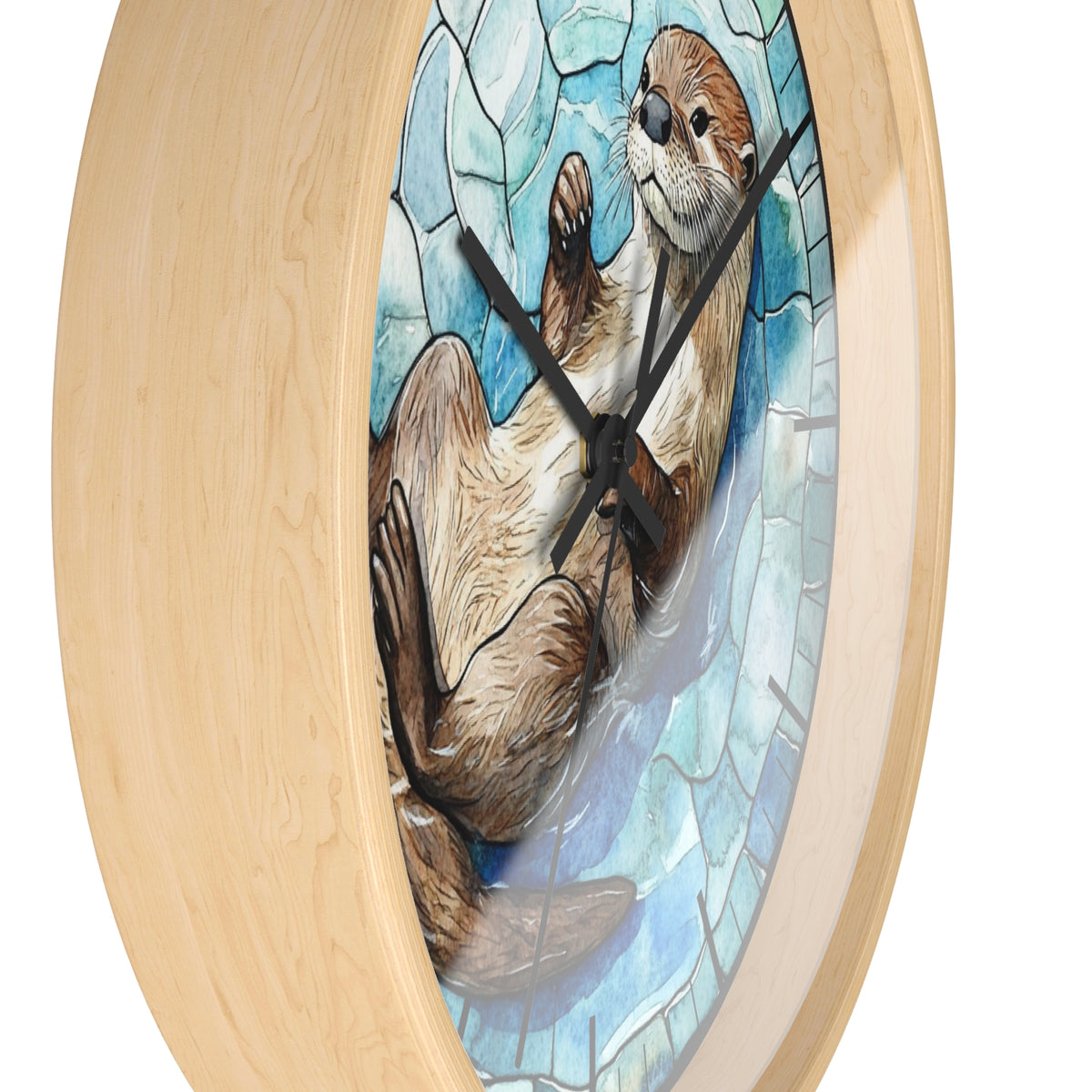 A round wall clock with a light natural wood frame and a stained-glass-style illustration of an otter in blue and white tones on the face, shown against a plain white background.