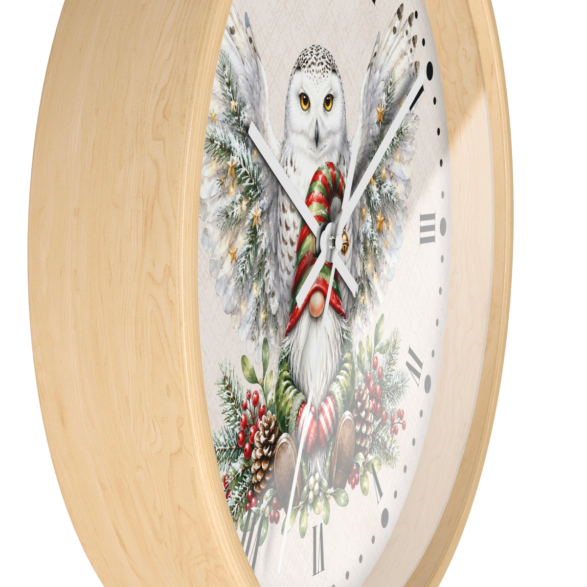 A round wall clock with a light natural wood frame and a white dial featuring a detailed illustration of a snowy owl with wings, a red striped scarf, and holiday greenery.