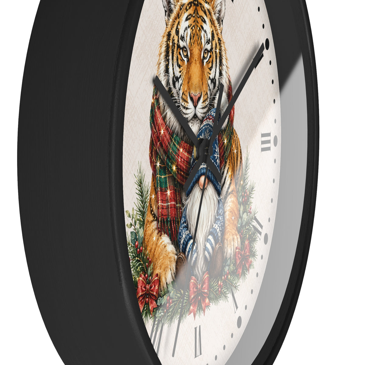 A round wall clock with a black frame and a white face featuring a detailed illustration of a tiger wearing a red and green plaid scarf, surrounded by festive greenery and red bows.