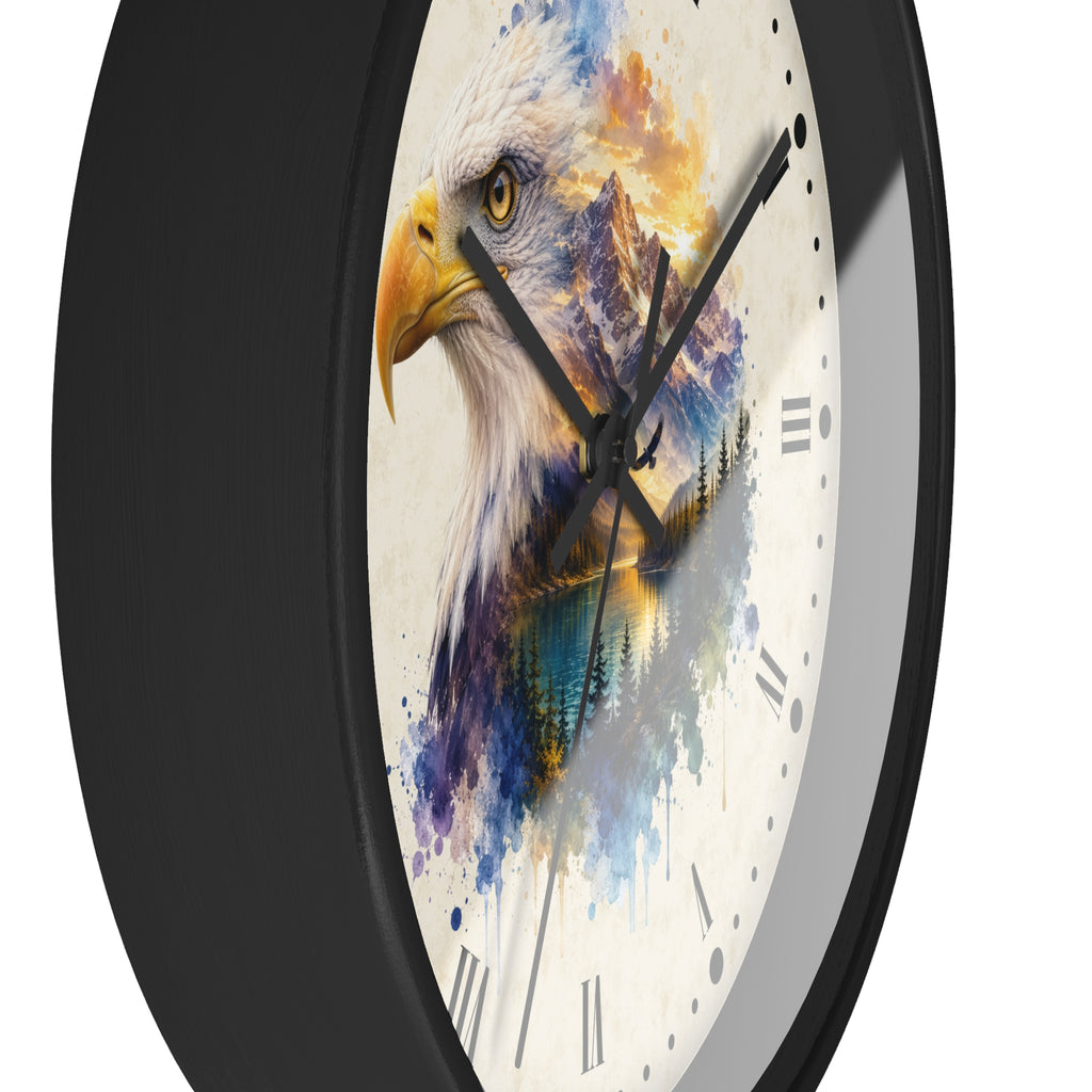 A close-up of a round wall clock with a black frame and a white face featuring a watercolor-style bald eagle portrait with blue, yellow, and orange painted details.