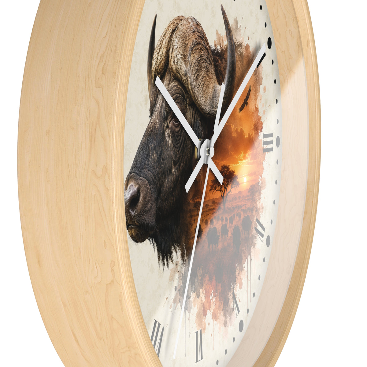 Round wall clock with a light natural wood frame and a printed face featuring a bison head over an orange sunset scene, with white hands and black Roman numerals.