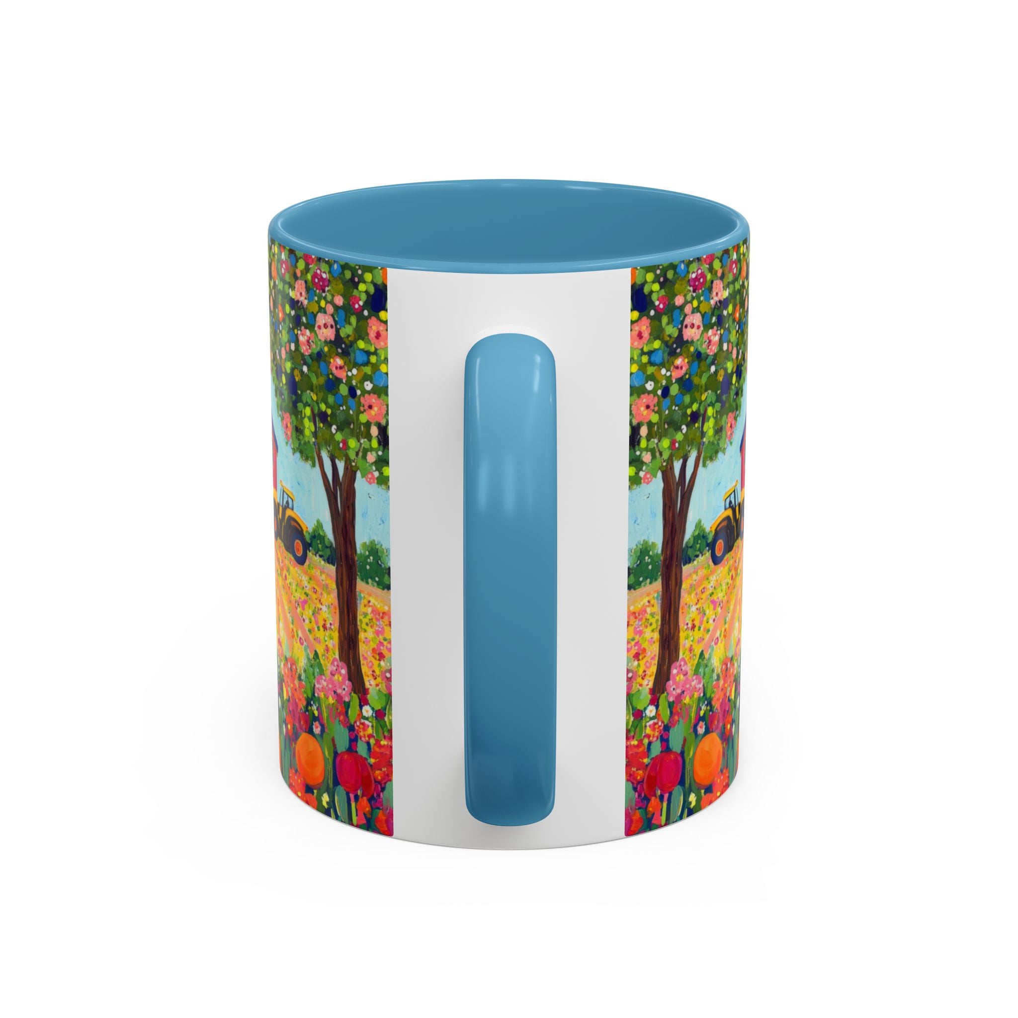 Colorful mug with floral design and blue handle on a white background