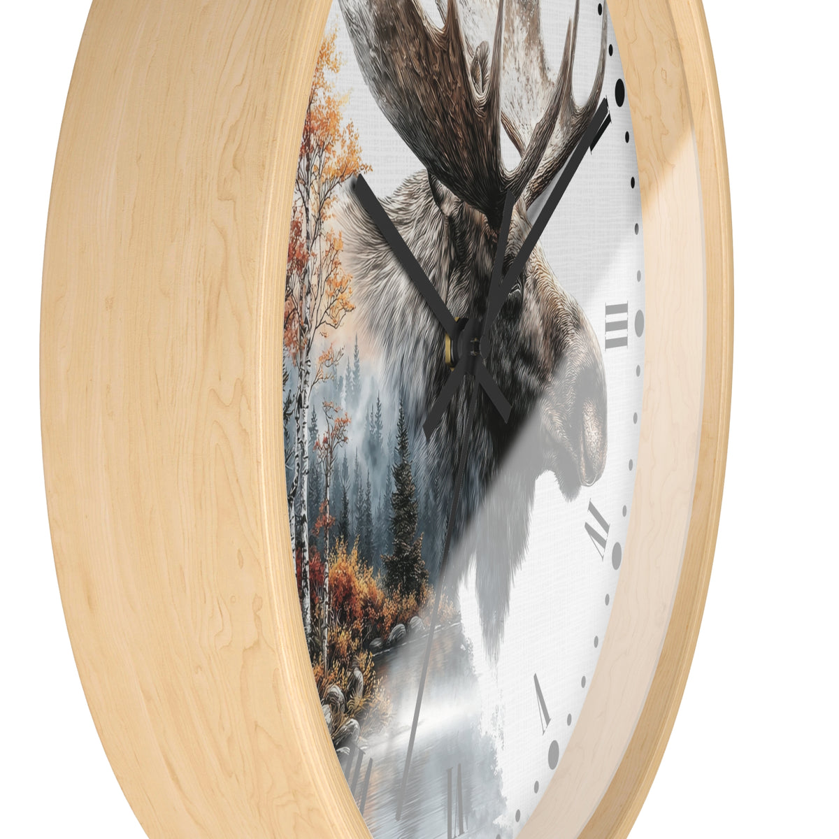 Round wall clock with a light natural wood frame and a printed face showing a moose head over a misty forest scene with autumn trees, black Roman numerals, and black hands.