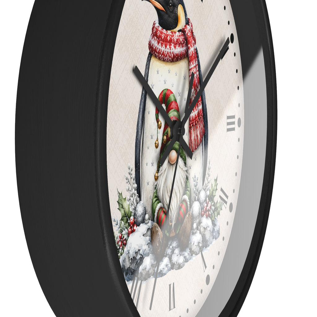 round black frame wall clock with a Christmas penguin and gnome design on a white background.