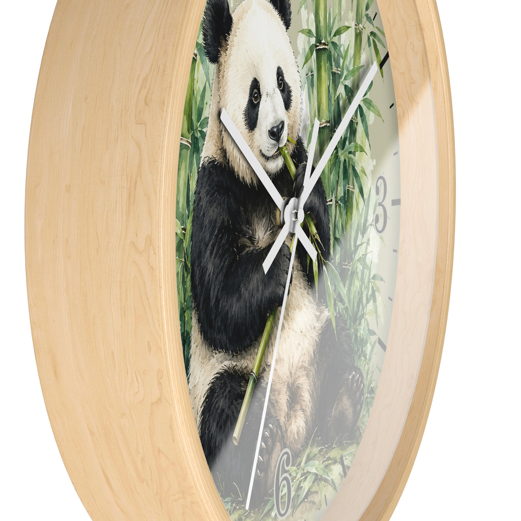 Round wall clock with a light natural wood frame and a printed panda-on-bamboo face, shown against a plain white background.