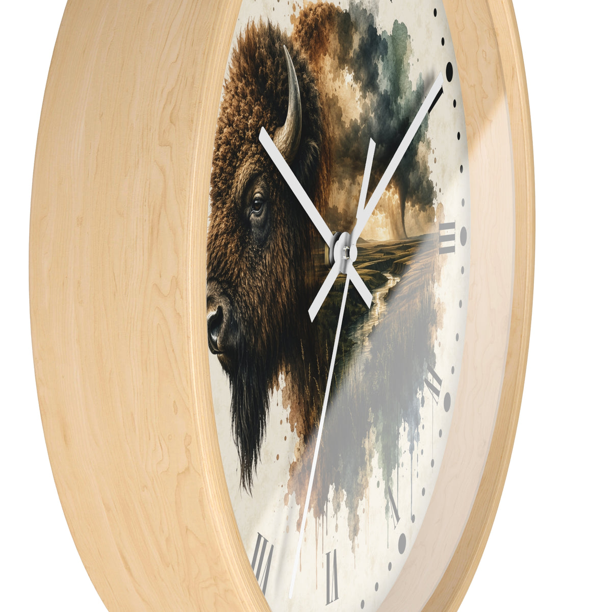 A round wall clock with a light natural wood frame and a printed dial featuring a bison illustration over a landscape scene with watercolor-style tree and sky elements.