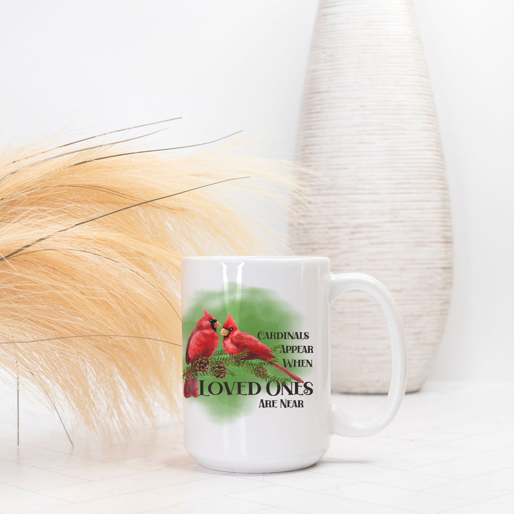 White mug with cardinal design and text on a white background