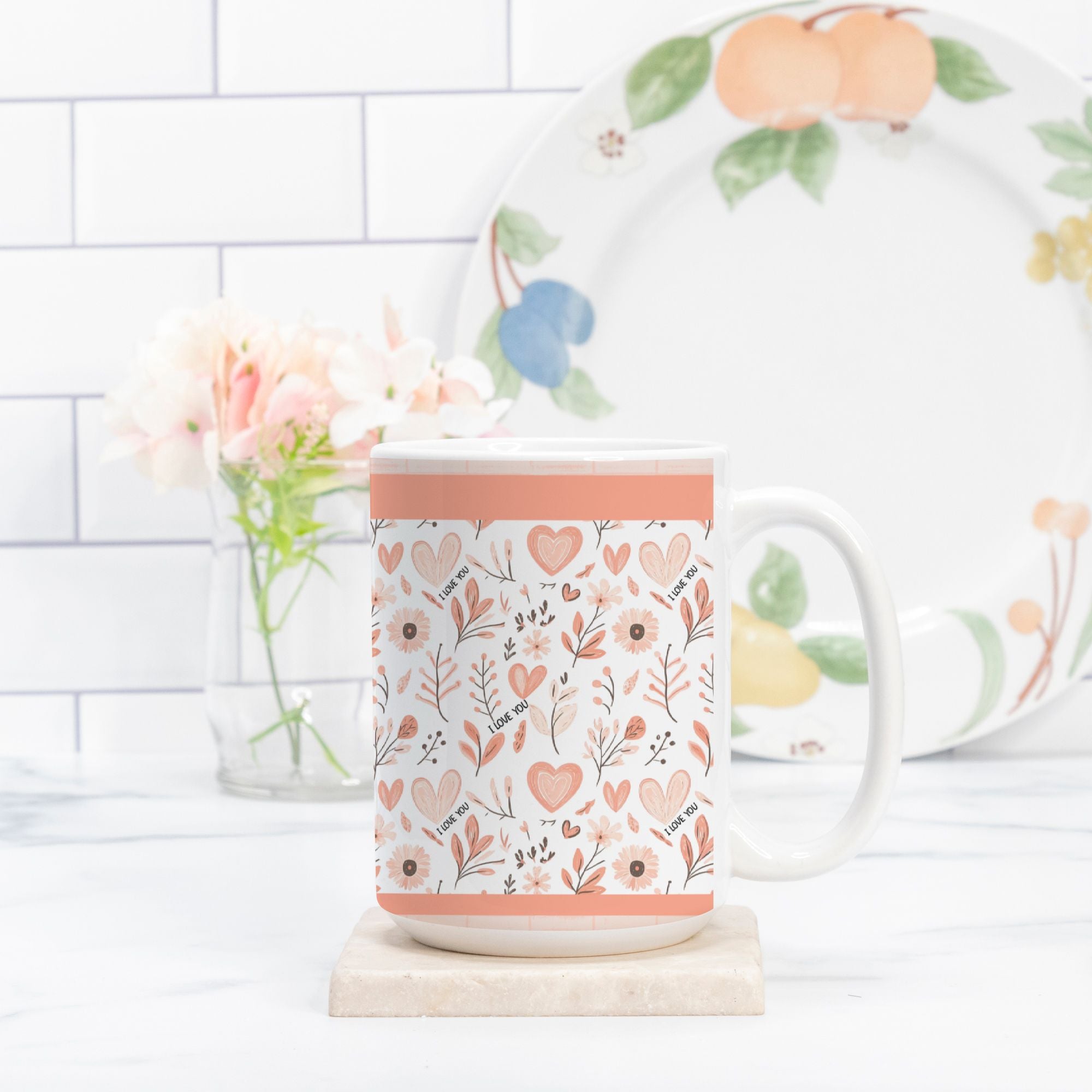 Decorative mug with floral pattern on a white surface with a blurred background