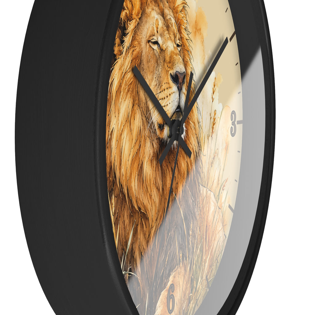 A round wall clock with a black frame and a printed lion face in a grassy scene as the clock face, shown against a plain white background.