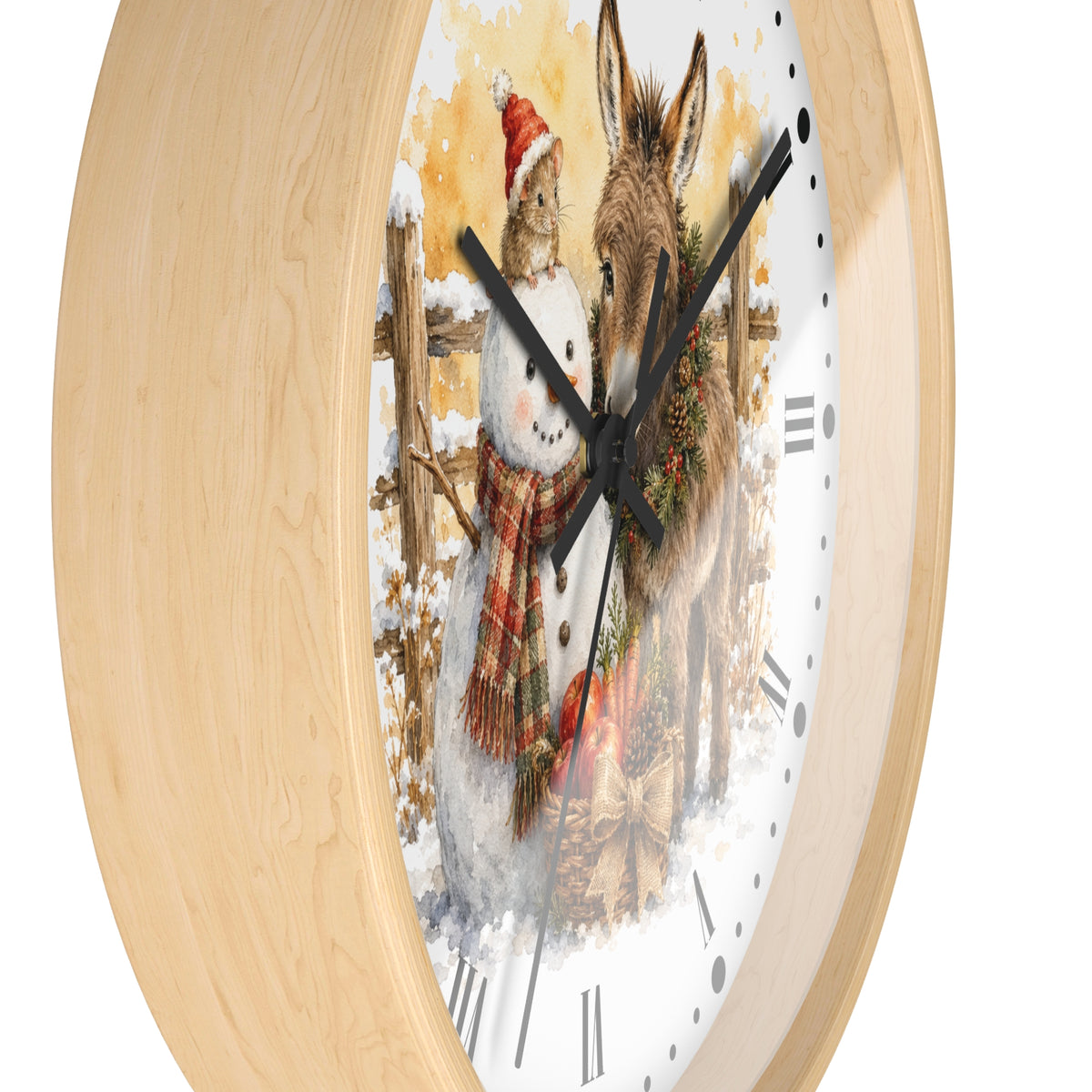 A round wall clock with a light natural wood frame and a white dial featuring a painted winter scene of a rabbit in a Santa hat next to a donkey, with black clock hands and Roman numerals.