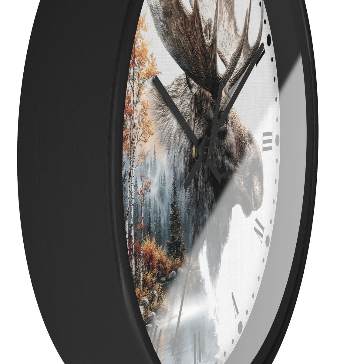A close-up of a round wall clock with a black frame and a white face featuring a moose head over a forest scene with autumn trees.