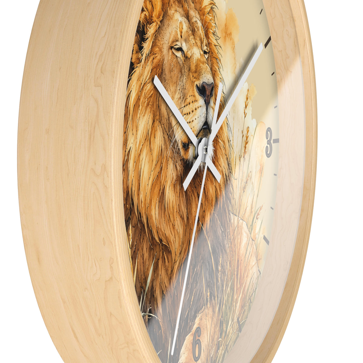 Round wall clock with a light natural wood frame and a printed lion face and grass artwork on the dial, shown against a plain white background.