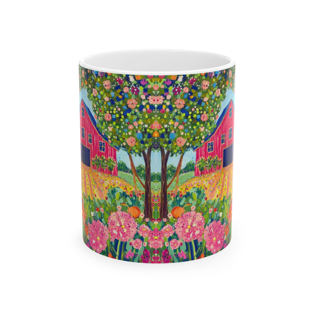 Mug with a colorful garden design featuring flowers and buildings on a white background