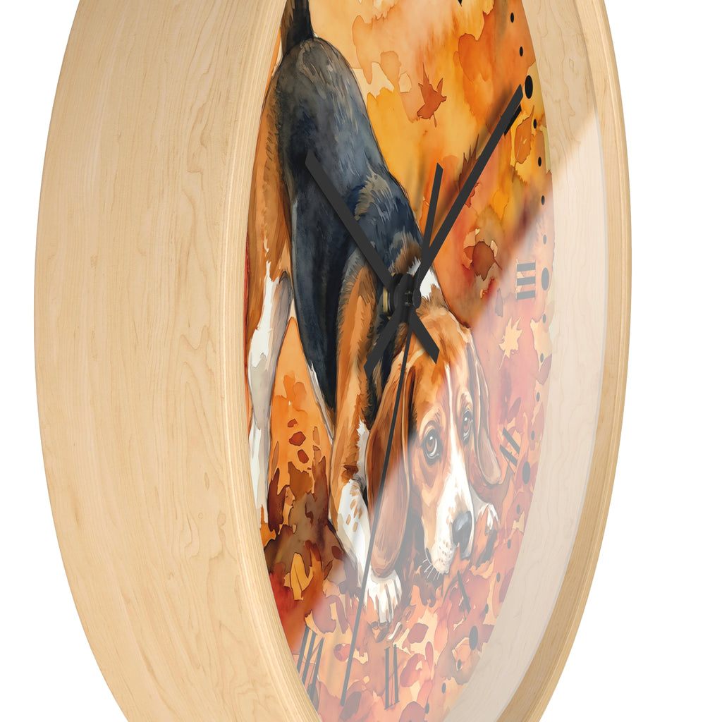Round wall clock with a light natural wood frame and a printed artwork of a beagle dog surrounded by orange autumn leaves.