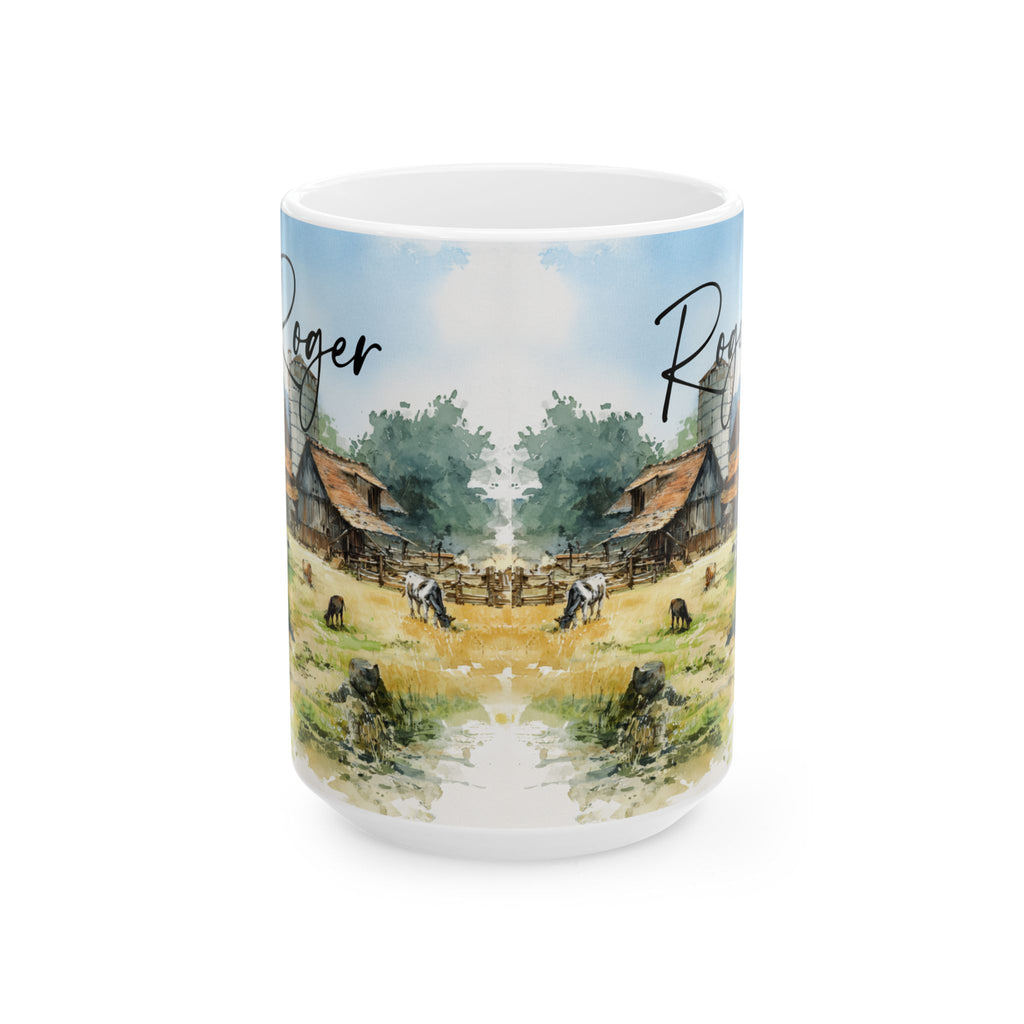 Front of mug with a scenic design of cows in a field and rustic buildings.