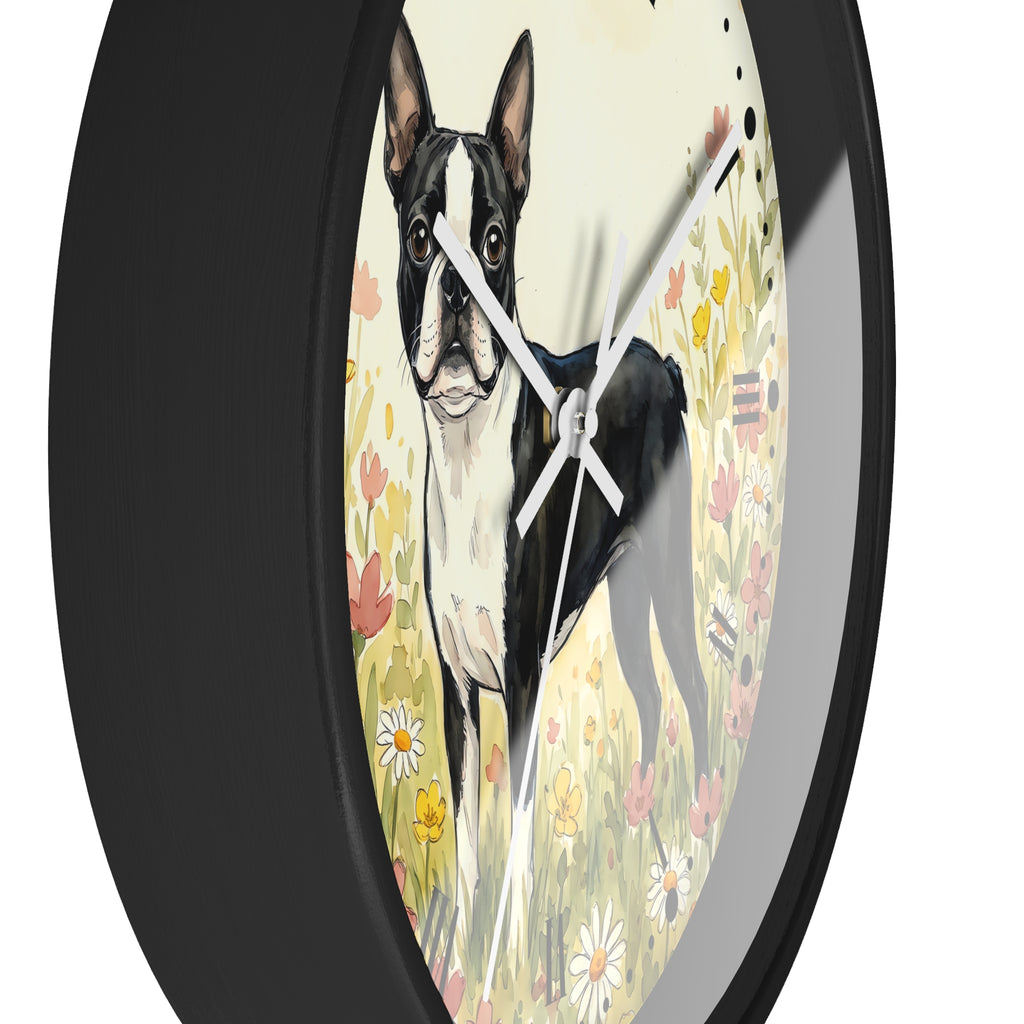 Round wall clock with a black frame and a printed illustration of a black-and-white Boston Terrier standing in a flower field, shown against a plain white background.
