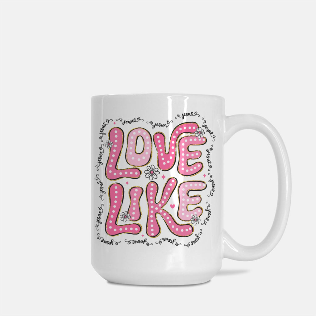 White mug with pink text 'LOVE LIKE' on a white background
