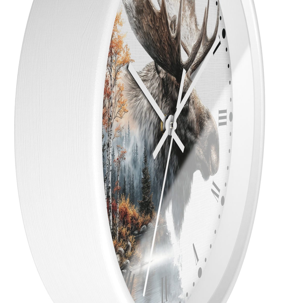 A white round wall clock with a printed design on the face showing a moose head over an autumn forest scene, photographed against a plain white background.