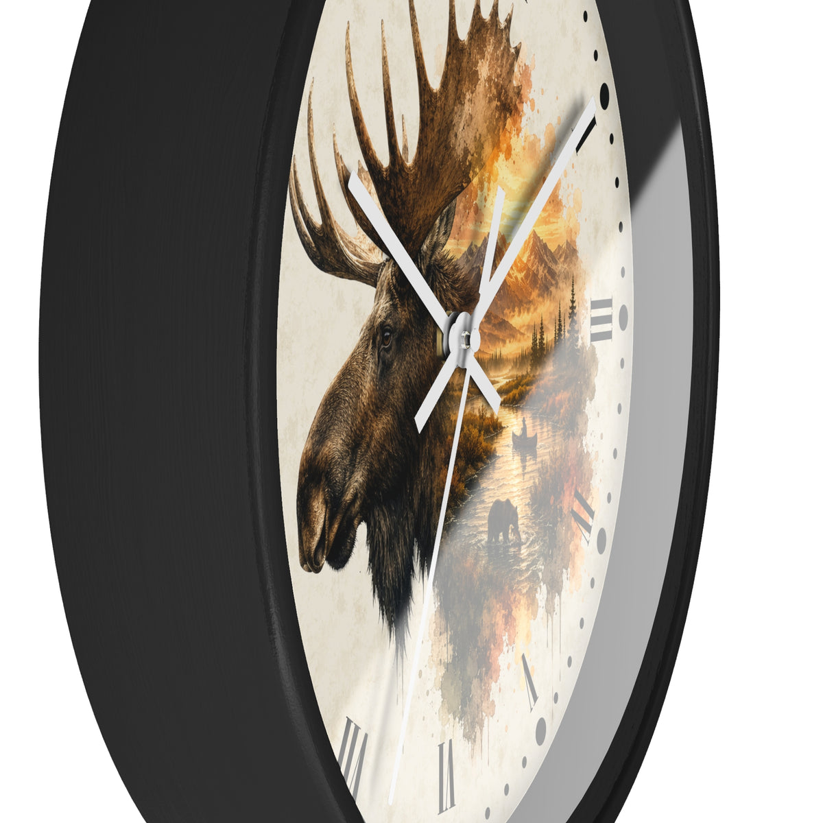 A close-up of a round wall clock with a black frame and a cream-colored face featuring a moose head illustration blended with warm-toned landscape artwork. Roman numerals are visible around the dial.