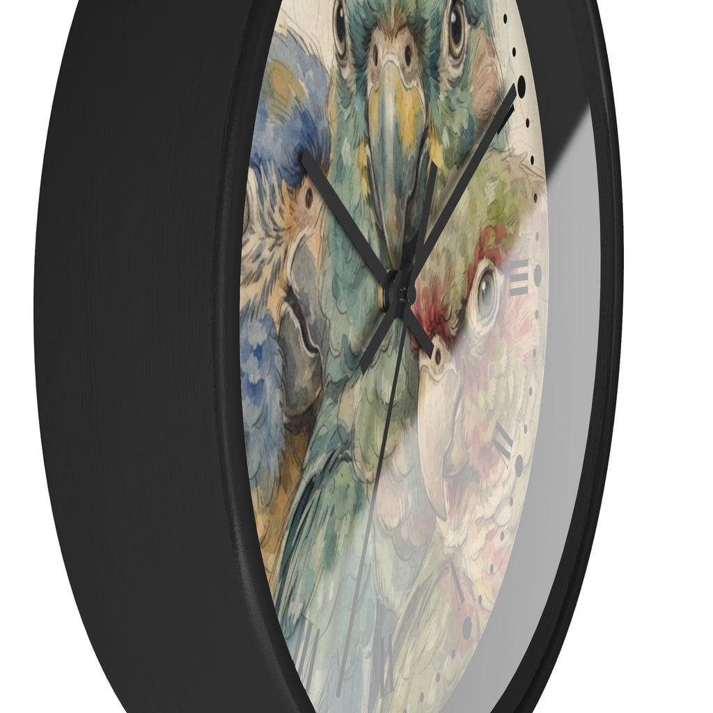 A round wall clock with a black frame and a printed face featuring watercolor-style parrots in blue, green, yellow, and pink tones.