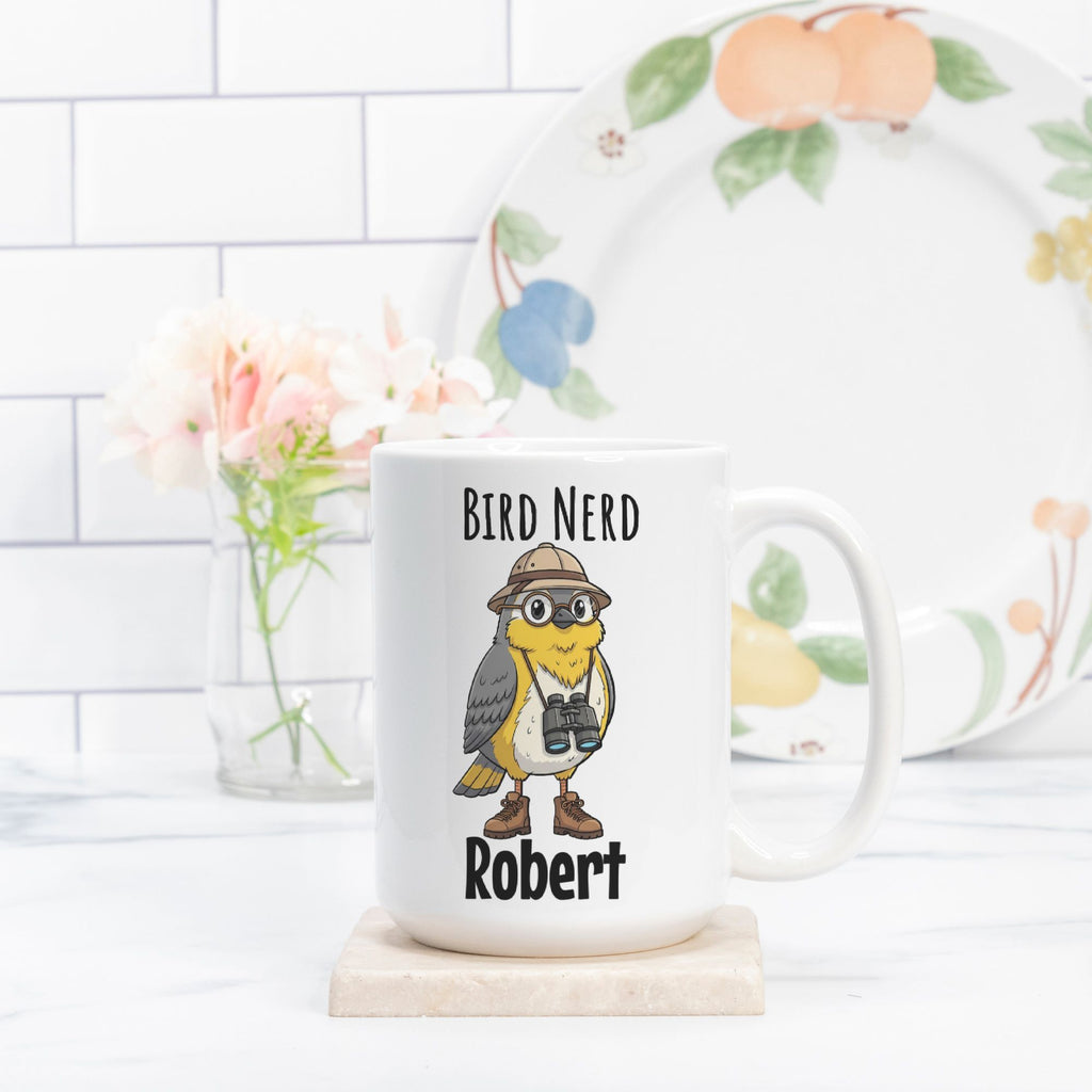 Mug with 'Bird Nerd Robert' design on a white surface with a decorative plate in the background.