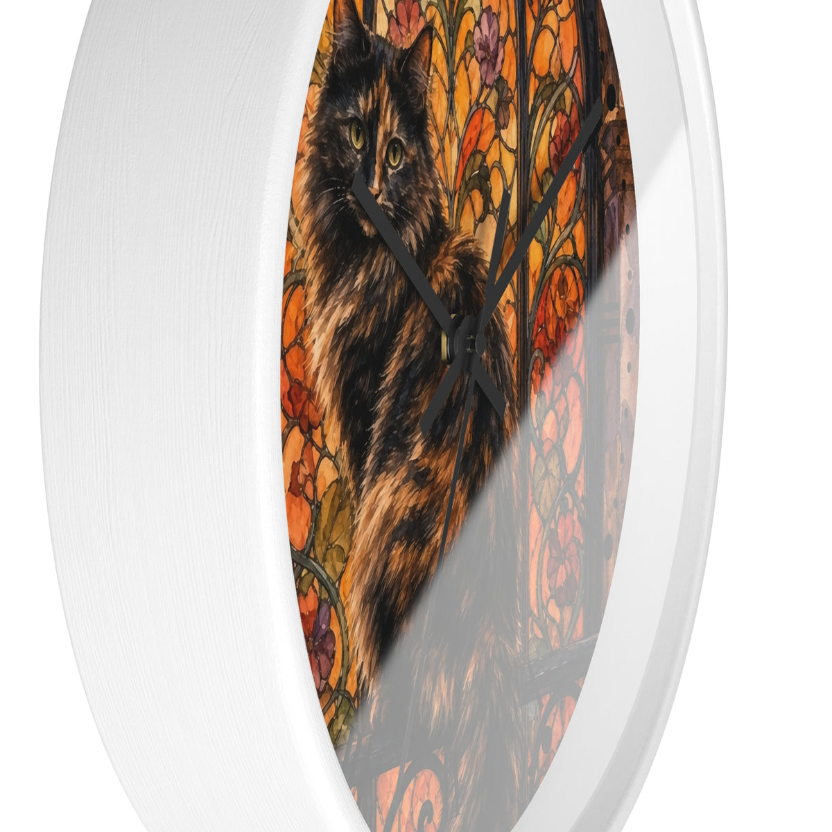 Round wall clock with a white frame and a printed cat artwork in warm autumn colors, shown against a plain white background.