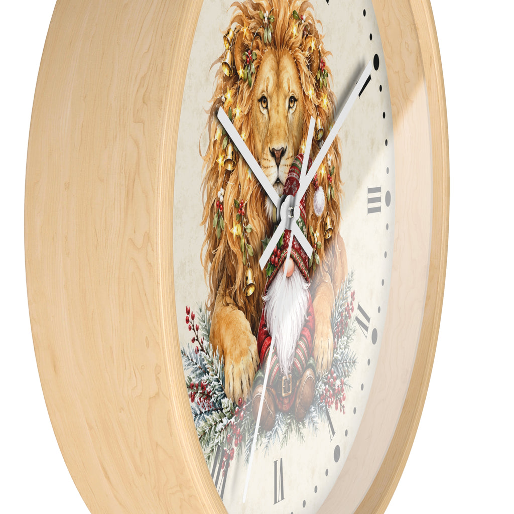 A round wall clock with a light natural wood frame and a festive printed face showing a lion wearing a Christmas wreath and Santa Claus holding a bell.