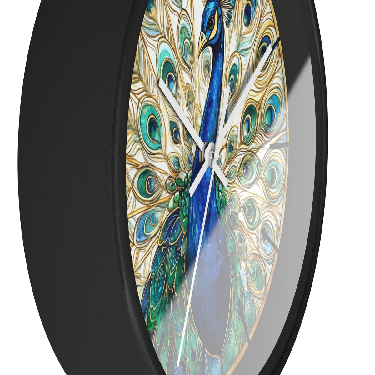 A close-up of a round wall clock with a black frame and a decorative peacock face printed on the dial. The peacock artwork features rich blues, greens, and gold tones, with white clock hands.