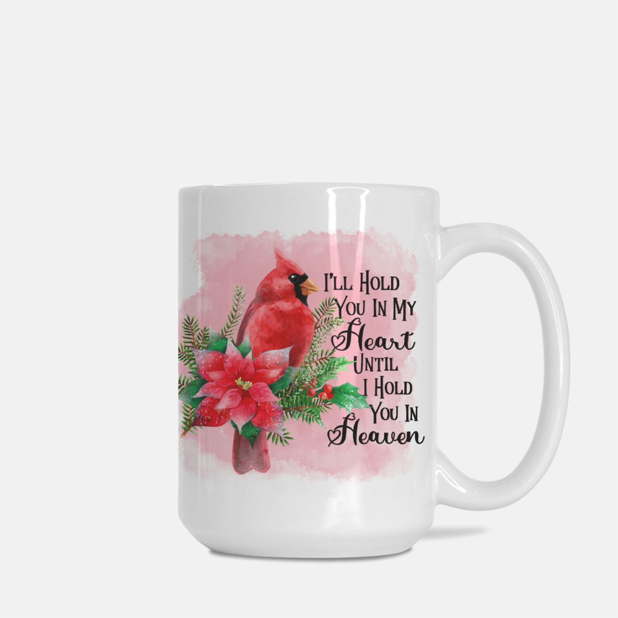Mug with a cardinal and floral design on a white background