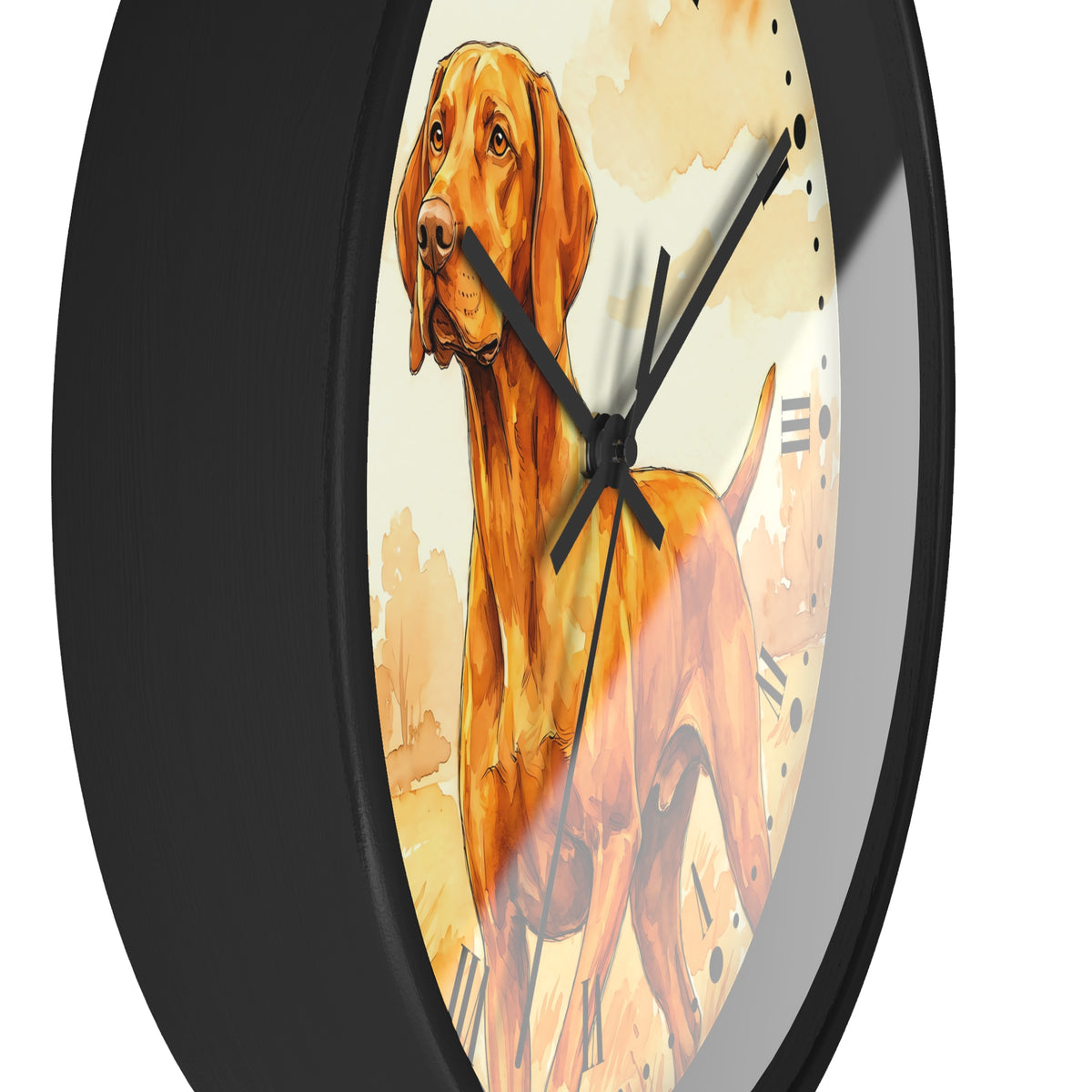 A close-up of a round wall clock with a black frame and a printed dog illustration on the face. The dog artwork is warm brown and orange with cream background tones, and black clock hands and markers are visible.