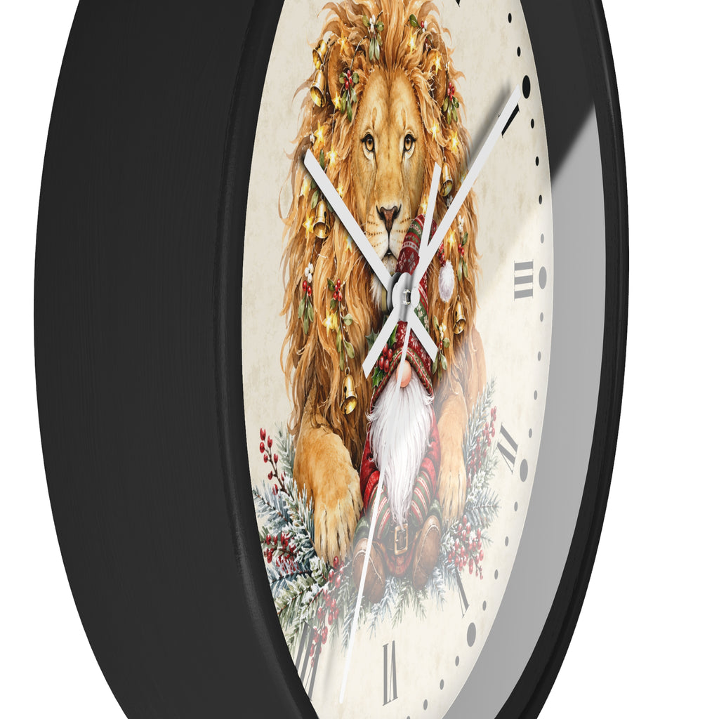 A round wall clock with a black frame and a festive illustration of a lion wearing a Santa hat and wreath on an off-white dial with Roman numerals.