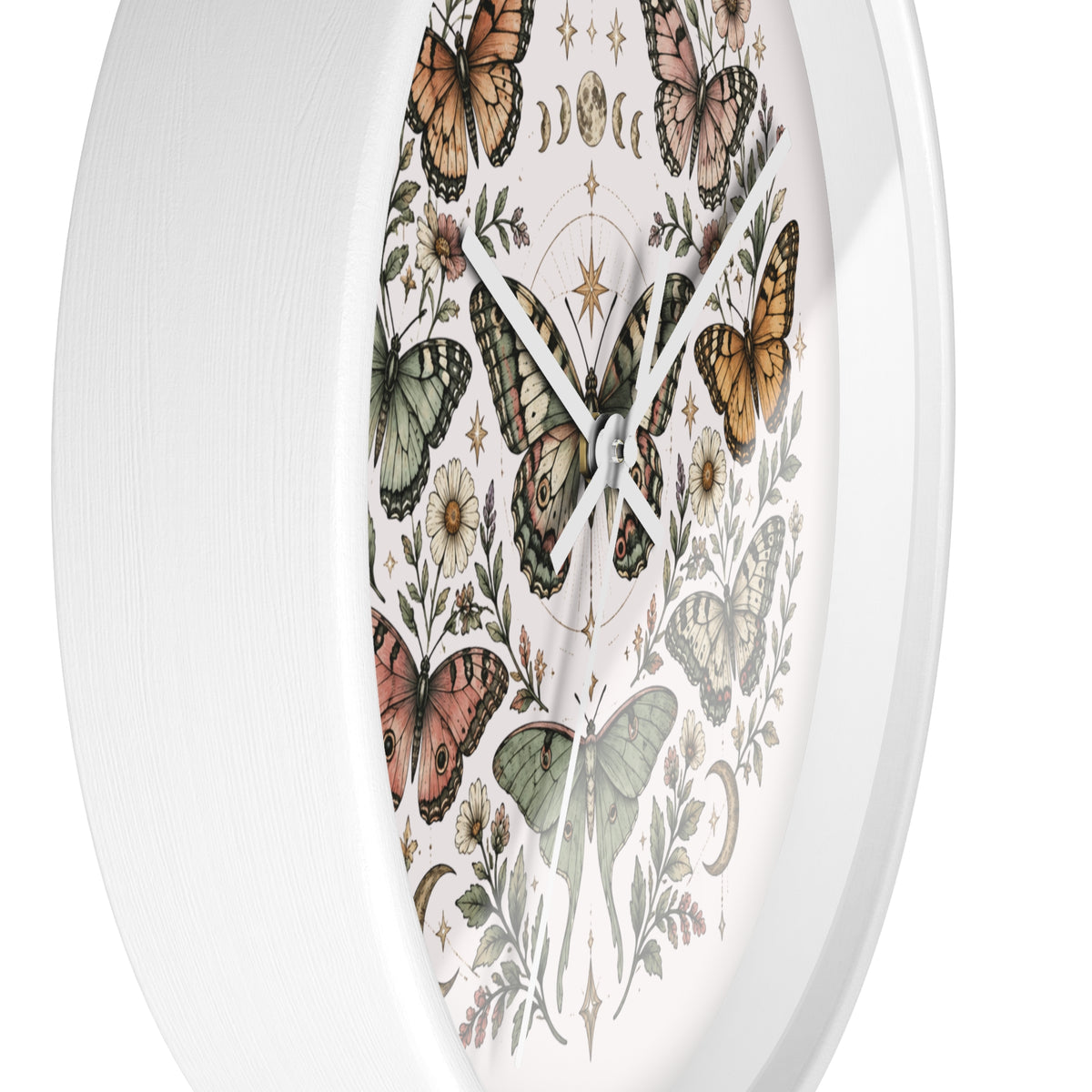 A white oval wall clock featuring a vintage-style printed dial with illustrated butterflies, flowers, and celestial symbols on a clean white background.