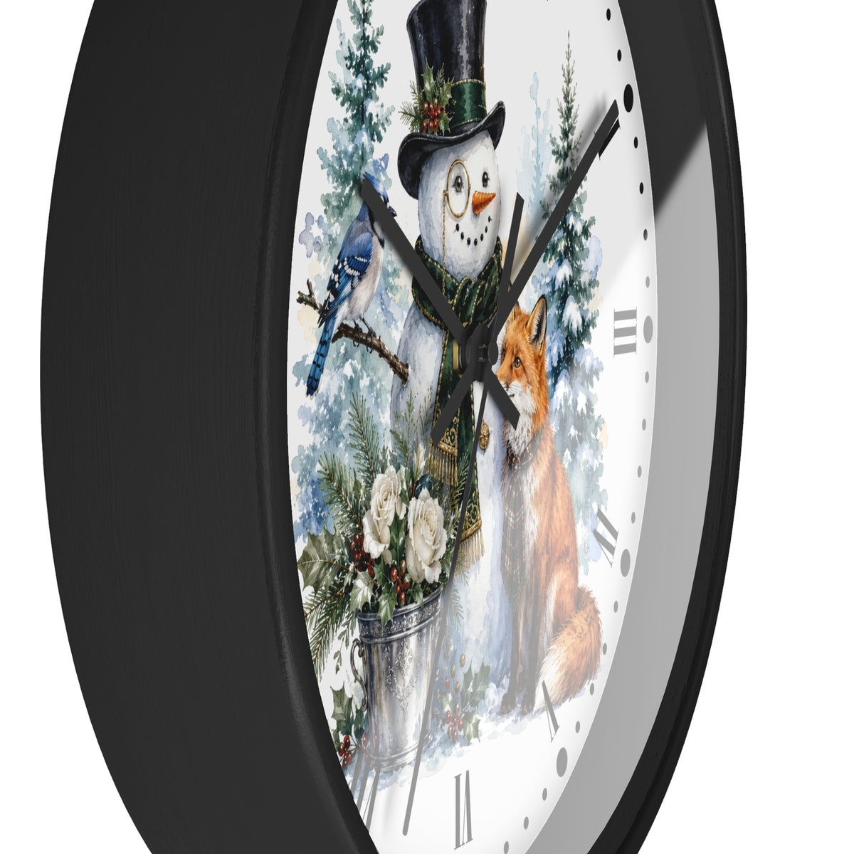 A round wall clock with a black frame and a white face featuring a winter holiday illustration of a snowman, bluebird, fox, evergreen trees, and flowers.
