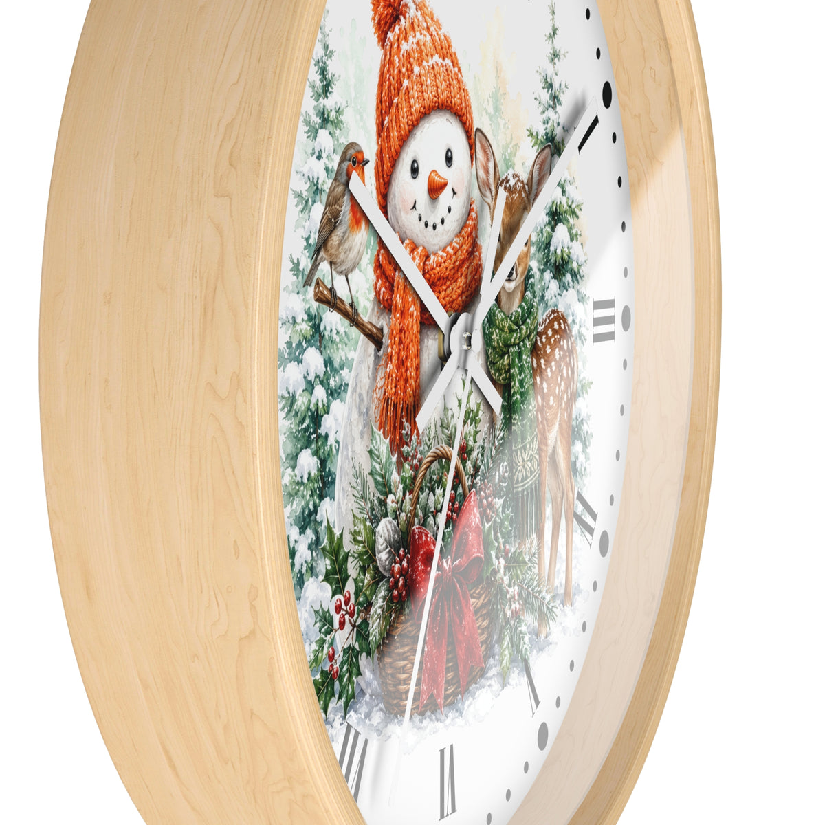 A round wall clock with a light natural wood frame and a festive winter illustration on the face, featuring a snowman in an orange knit hat, birds, deer, and evergreen trees.