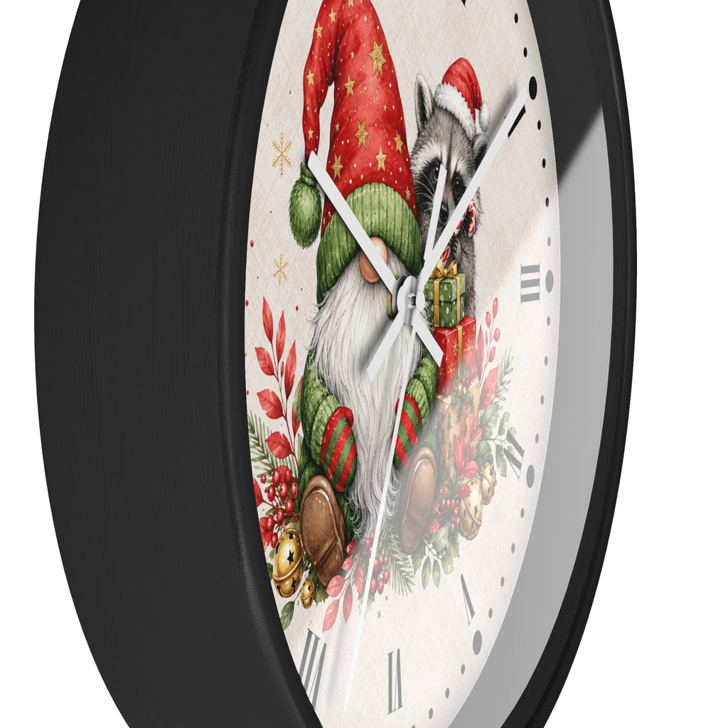 A round wall clock with a black frame and a white face featuring a festive illustration of a raccoon dressed as Santa Claus, surrounded by holiday greenery and gifts.