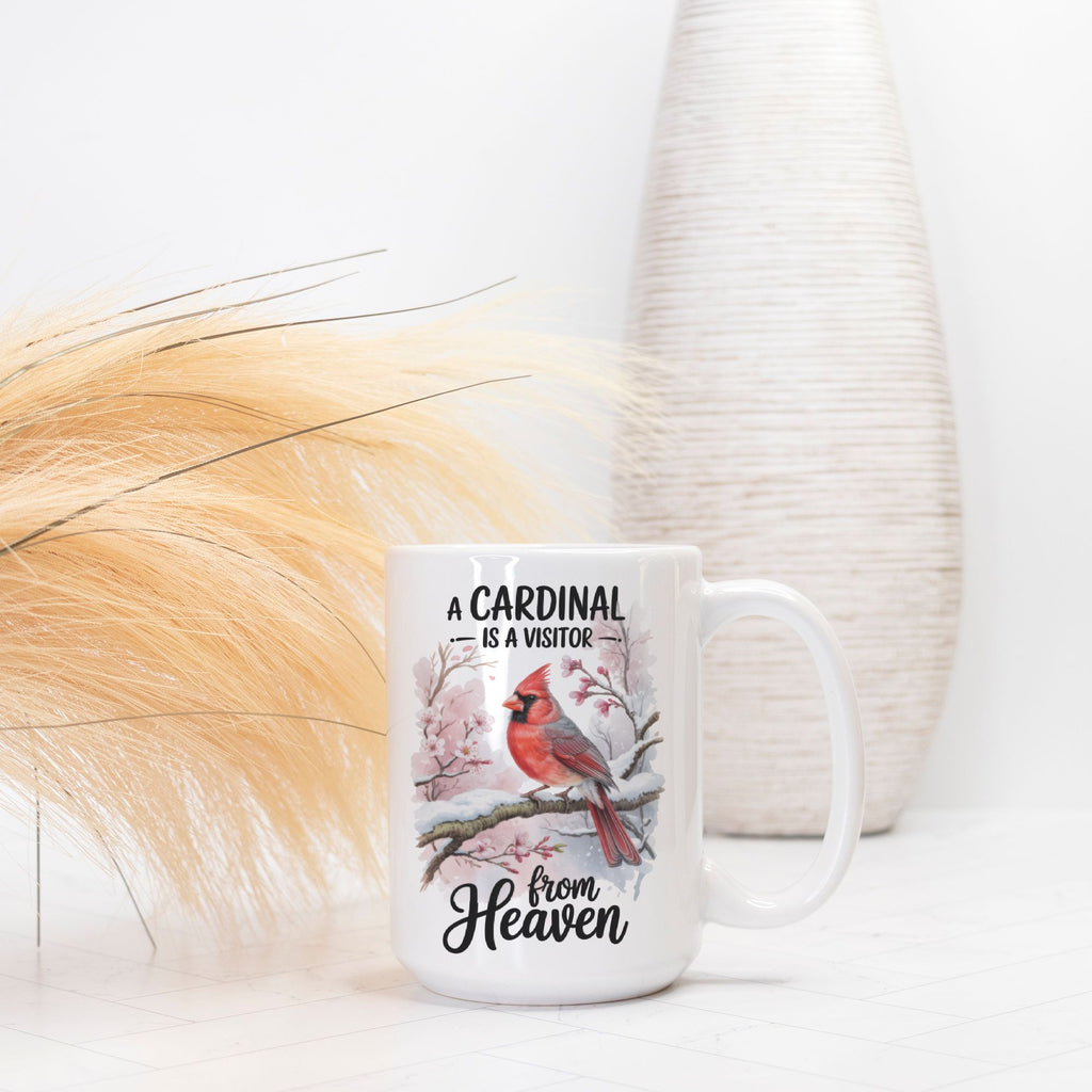 White mug with cardinal design and text on a white background