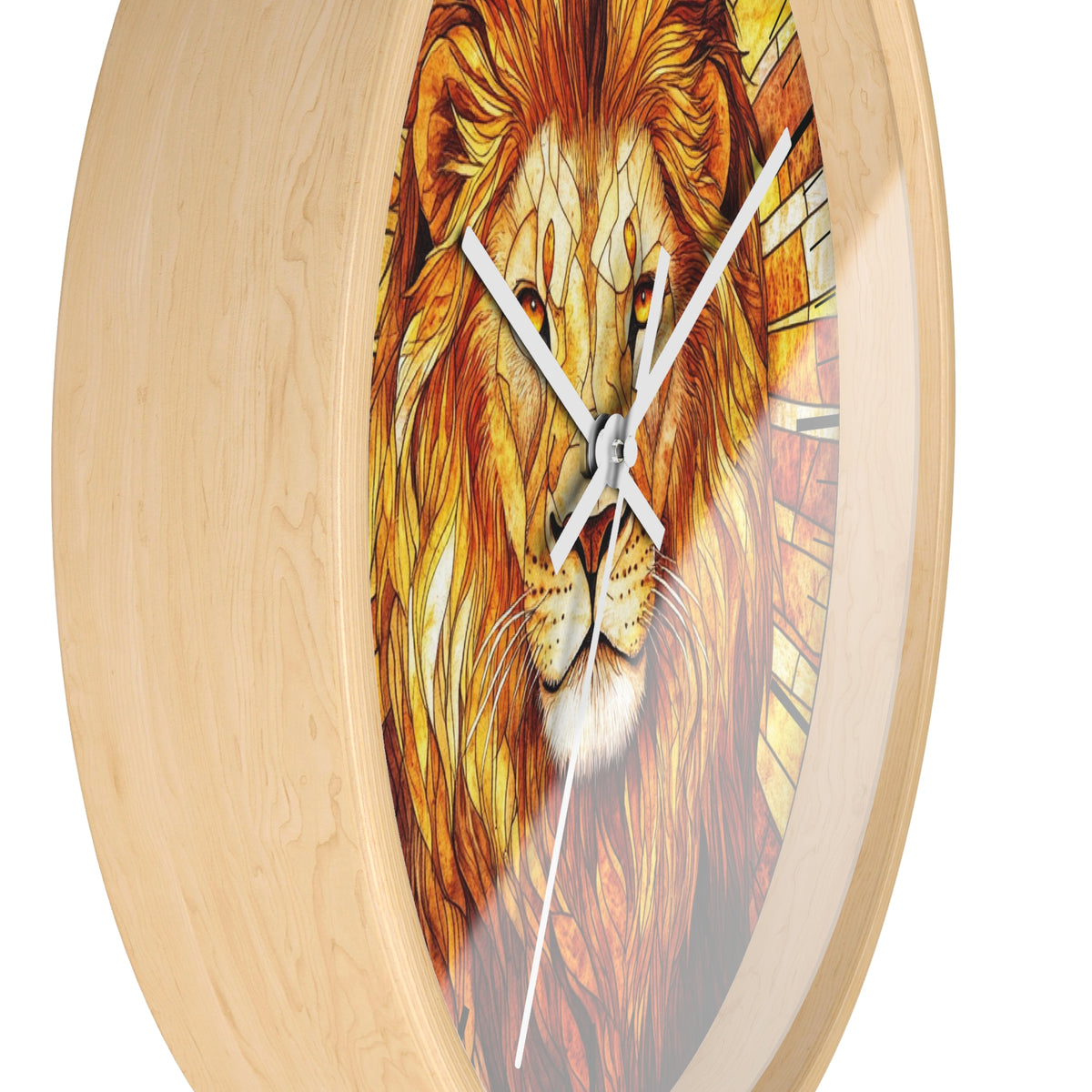 Round wall clock with a light natural wood frame and a printed lion face design in warm orange, brown, and yellow tones, with white clock hands.