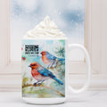 White mug with bird design and 'Perfect Love Casts Out Fear' text, filled with hot chocolate.