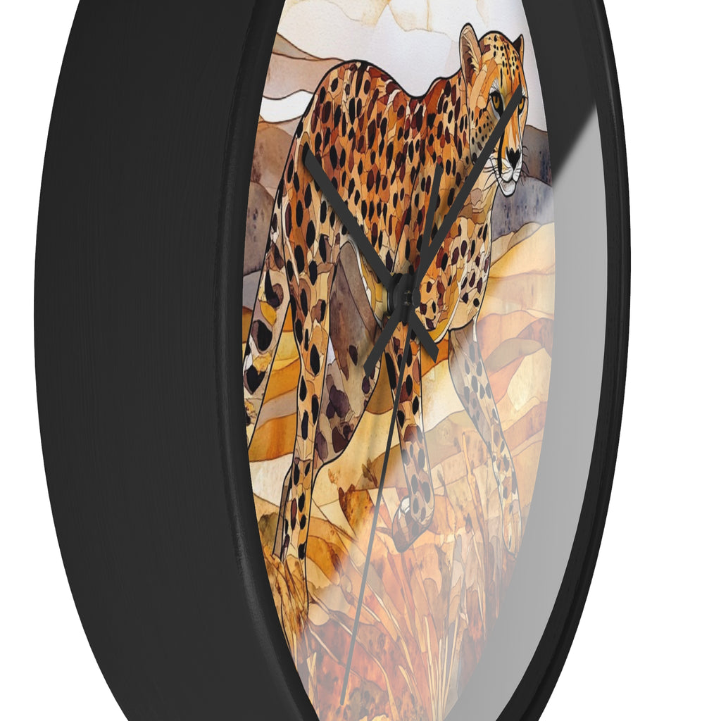 Round wall clock with a black frame and a printed artwork of a cheetah in warm tan, brown, and black tones on a white background.