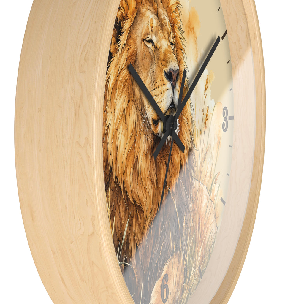 A round wall clock with a light natural wood frame and a printed face featuring a detailed lion illustration in warm brown, beige, and orange tones. The clock has black hands and partial black numerals, shown against a plain white background.