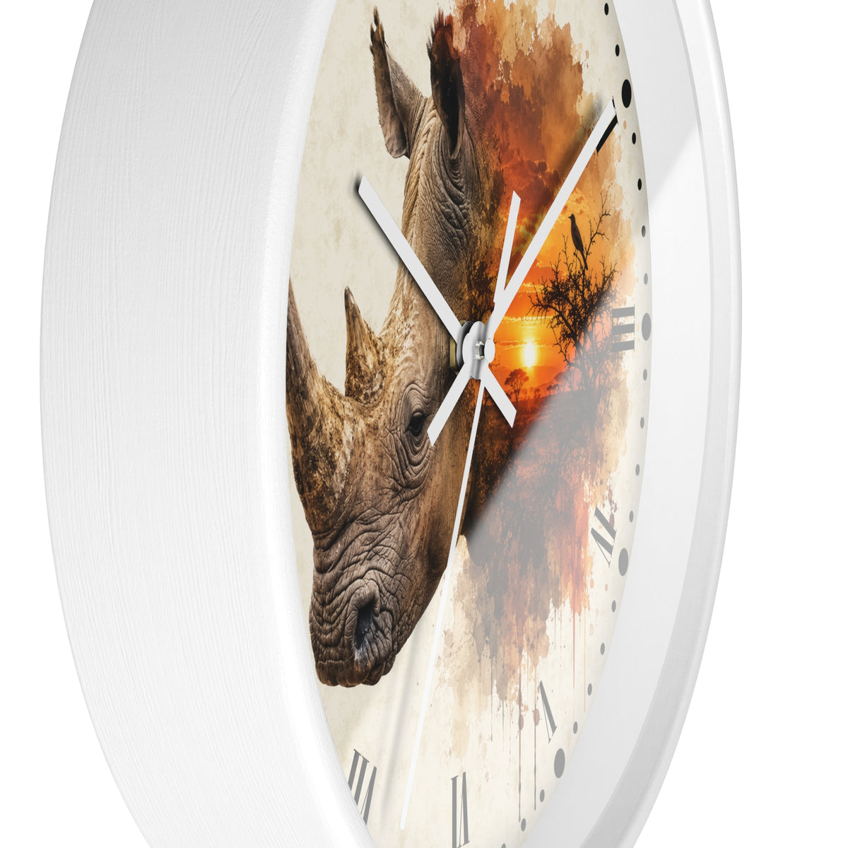 A round wall clock with a white frame and a printed design featuring a rhinoceros head over an orange sunset scene, with white hands and black Roman numerals.