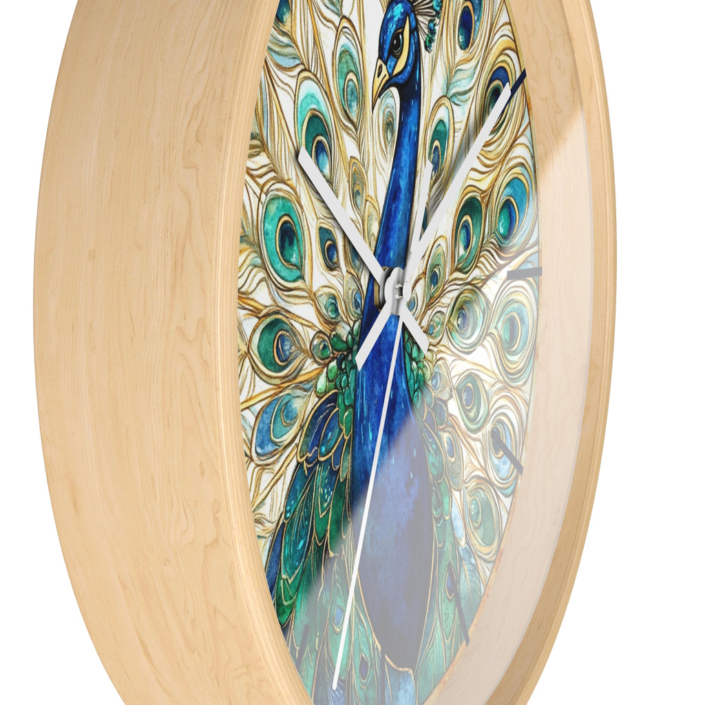 Round wall clock with a light natural wood frame and a peacock artwork featuring blue, teal, green, and gold feather patterns on a white background.