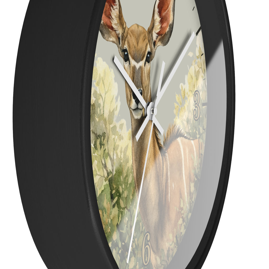 Round wall clock with a black frame and a printed deer illustration on the face, shown against a plain white background.