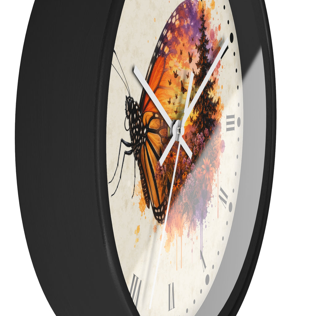 A close-up of a round wall clock with a black frame and a cream-colored face featuring a colorful butterfly and floral watercolor design.